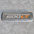 Load image into Gallery viewer, MCLAREN 600LT INTERIOR CENTRE CONSOLE BADGE - SILVER/ ORANGE - 13AB135RP