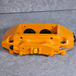 Load image into Gallery viewer, MCLAREN MP4  FRONT RIGHT 4-POT IRON CALIPER (ORANGE ) 11C0062CO.03.03